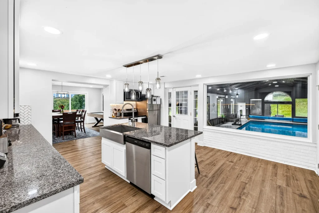 Kitchen island with a view into the indoor pool house